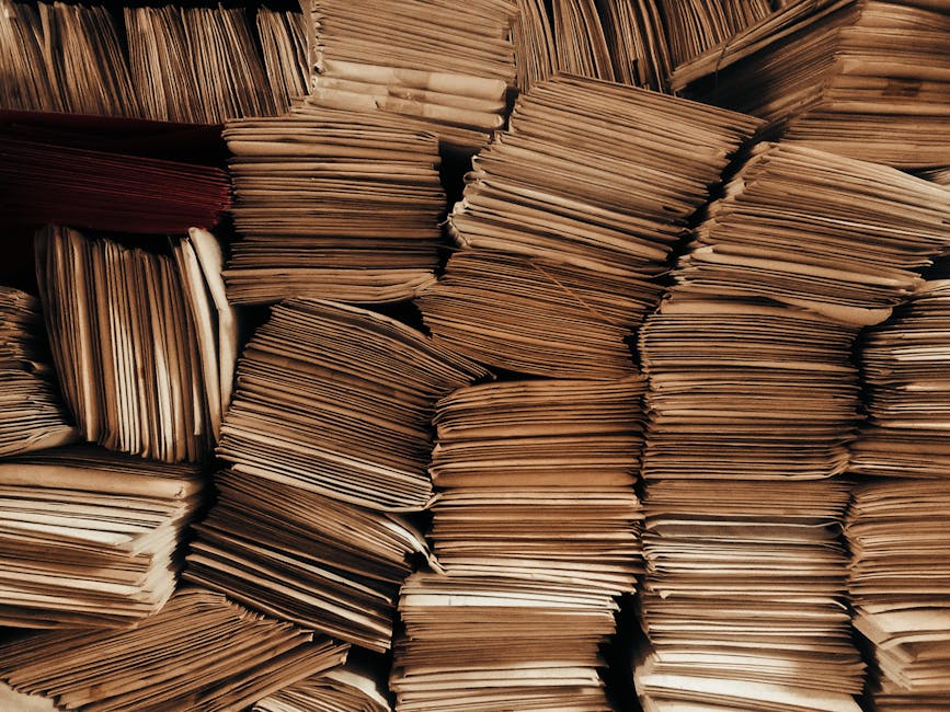 A detailed view of neatly stacked brown envelopes showcasing organization.